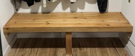 Custom cedar bench built into an entryway